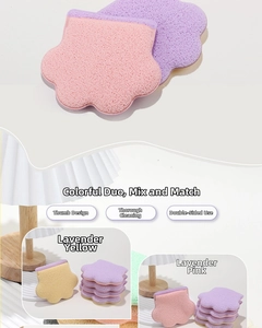 Detail of cat paw face sponges with thumb slot design and dual-sided cleaning textures