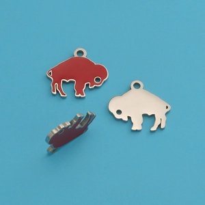 Cartoon red buffalo pendant in mirror stainless steel from multiple viewing angles