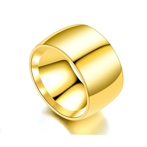 Macro shot of 45-degree angle showing thickness of wide gold stainless steel band ring