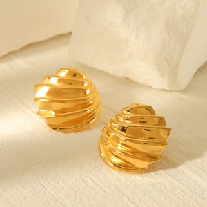 18k gold plated stainless steel spiral stud earrings on decorative white stone base