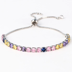 Detailed macro shot of silver adjustable bracelet featuring multicolor round zircons