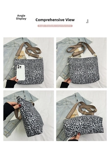 Detailed views of leopard print canvas crossbody bag with wide geometric strap and golden hooks