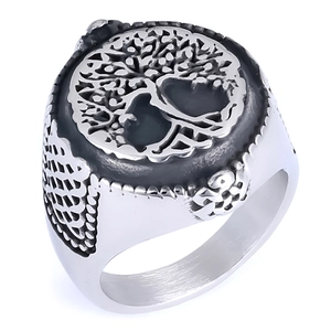 Detailed relief of the Tree of Life on a vintage silver stainless steel men's ring