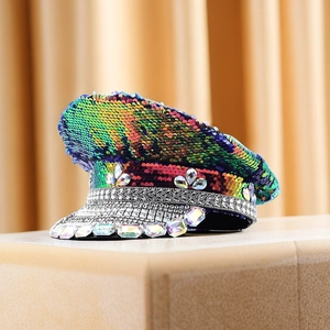 Detailed view of colorful sequined captain hat with sparkling rhinestones for parties