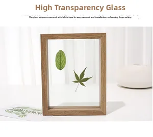 Detail of wooden frame showing glass secured with velvet tape for safety and easy setup