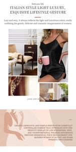 Detail view of luxurious black silk satin nightgown with elegant strap design and smooth texture