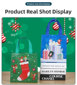 Detail of green and blue Christmas non-woven gift bags with snowman and nutcracker prints