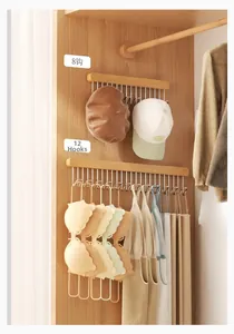 Detail of 8 and 12-hook pull-out hangers made of solid wood and metal for closets