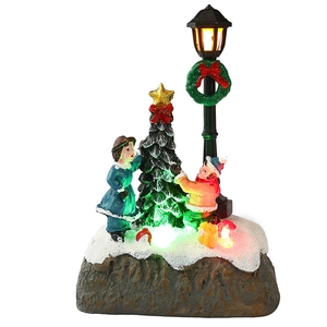Luminous Christmas resin village ornament with vintage street lamp and figures