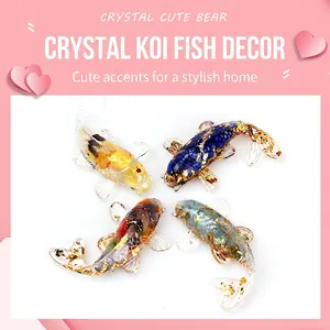 Set of four handmade crystal koi fish figurines with gold foil accents for desk decor