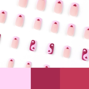 Purple heart and yin yang patterned press on nails with pink and red French design