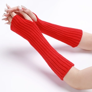 Detailed knit texture of red long fingerless gloves with a classic ribbed pattern