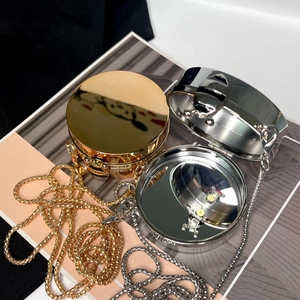 Mini round acrylic hard shell crossbody bag with metal chain and interior mirror
