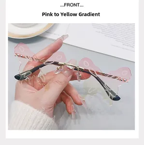 Detail of butterfly rimless sunglasses with pink to yellow gradient lenses and metal arms