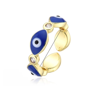 Detail of 18k gold plated evil eye ring with blue enamel and zircon stones