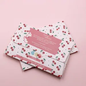 Pink jewelry polishing cloth in decorative cherry patterned gift packaging for silver care