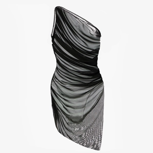 Detail of black mesh one-shoulder mini skirt with ruched texture and sheer fabric
