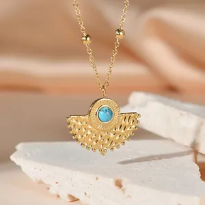 Vintage 14K gold plated fan necklace with turquoise stone and hammered texture detail