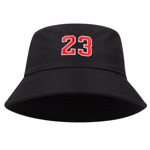 Detail shot of the red 23 embroidery on a black cotton canvas bucket hat