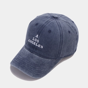 Detail of navy washed cotton baseball cap with white LOS ANGELES letter embroidery