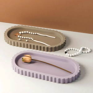 Minimalist oval wavy edge decorative tray in earthy brown and light purple resin