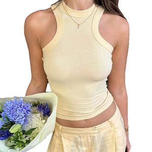 Chic light yellow ribbed knit halter crop top for women shown on model with flowers