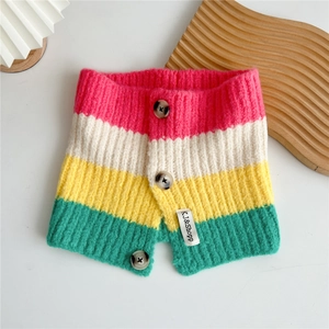 Detail of knit neck warmer with colorful stripes and three white button closures