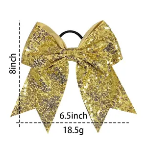 8 inch large gold sequin hair bow with black elastic band shown with measurements
