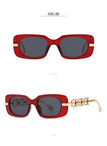 Detail view of red square sunglasses with golden hollow chain metal temples and dark grey lenses