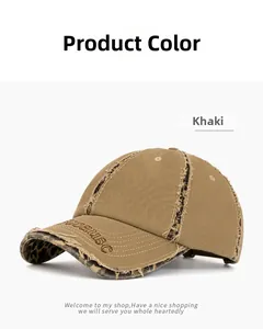 Detail of khaki distressed baseball cap with leopard print underbrim and frayed edges
