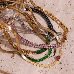 Detail of 18K gold plated stainless steel necklaces with multi-colored zircon stones