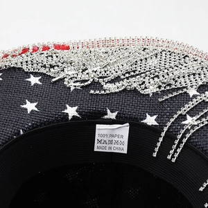 Western black cowboy hat with rhinestone fringe, white stars and woven paper texture
