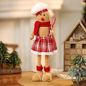Detailed view of gingerbread plush with chef hat and candy in a cozy holiday setting