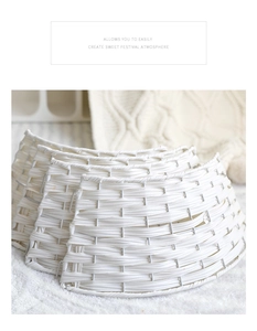 Detail of white hand-woven Christmas tree collar with a textured wicker basket finish