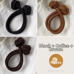 Detailed view of 3-piece set braided hair ties in black, coffee, and brown colors