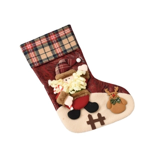 3D Santa Claus Christmas stocking with plaid cuff and reindeer decor on white background