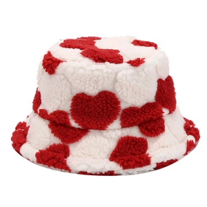 Winter plush bucket hat in white faux fur with red heart patterns for men and women