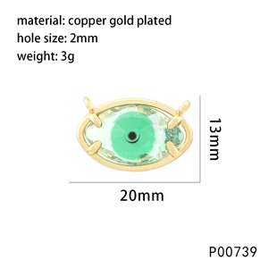 Detailed 13mm x 20mm copper gold plated evil eye pendant with a green gemstone inlay