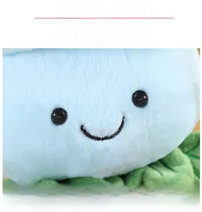 Detail of plush rose doll with soft light blue faux fur and fine embroidery smiley face