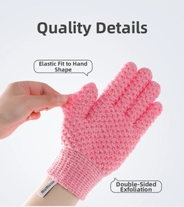 Detail of pink exfoliating shower glove showing textured fiber fabric and elastic wristband