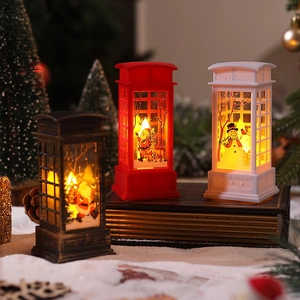 Christmas telephone booth lanterns with Santa and Snowman figures in festive warm LED light