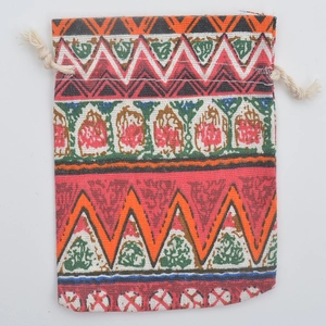Detailed close-up of ethnic style drawstring pouch with vibrant geometric patterns