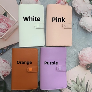 Detail view of 37-hole nail tool storage binders in four pastel leather colors