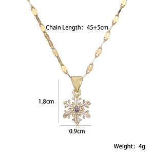 Détails du pendentif flocon doré 18K avec dimensions 1,8x0,9 cm et chaîne de 45+5 cm