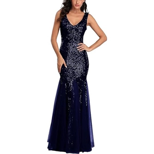 Detail of navy blue sequin V-neck evening dress with mermaid mesh hem for formal events