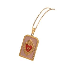 Vintage gold tarot card pendant necklace with pink enamel and red heart eye design