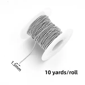 Detailed view of 1.5mm silver stainless steel bead chain on a 10-yard spool for DIY jewelry