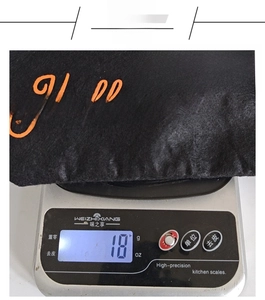 Lightweight Halloween candy gift bag weighing approximately 18 grams on a digital scale