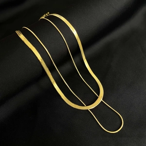 18K gold plated double-layered necklace with heart pendant and snake chain on black silk
