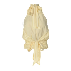 Close-up of light yellow halter top with bow tie and elegant striped texture details